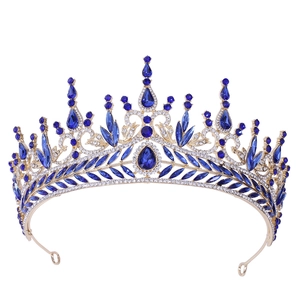 Luxury gold Baroque tiara with royal blue crystals and sparkling rhinestones