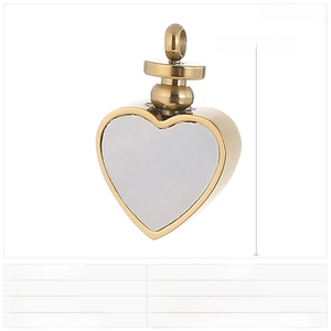 Detail of heart pendant with white shell inlay, size 16x10mm in polished gold finish
