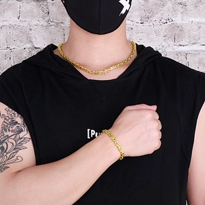 Men's 5mm two-tone stainless steel king chain necklace and bracelet set on model