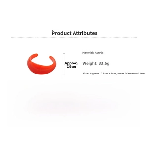 Detail showing red acrylic cuff bracelet dimensions 7.5cm by 7cm and 33.6g weight