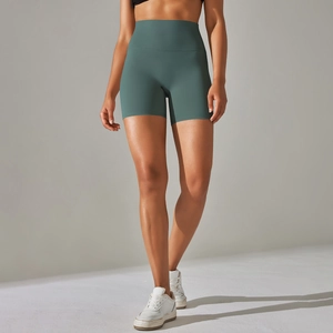 Detail view of high-waisted seamless fitness shorts with tummy control and peach lift effect