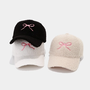 Winter lamb wool baseball caps with pink bow embroidery in black, white, and beige