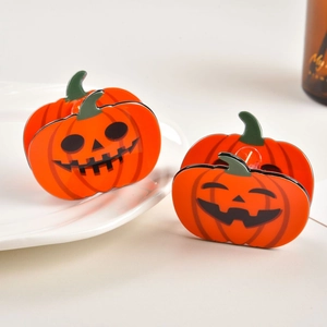 Lot de deux pinces à cheveux citrouille orange avec expressions pour Halloween