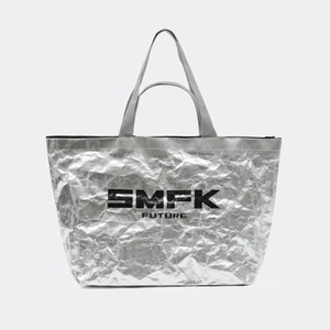 Detail of silver metallic textured gym bag with SMFK and Future text branding