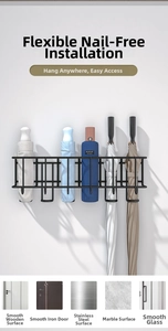 Detail of wall-mounted black metal umbrella rack with grid design for entryway storage