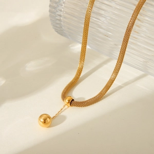 Detailed close-up of 18K gold-plated mesh chain necklace featuring a polished ball pendant