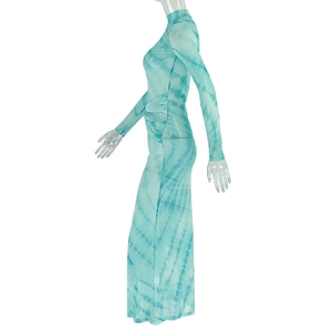 Detail of the high-neck tie-dye turquoise mesh dress showing the tight-fitting long sleeve
