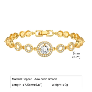 Detail view of gold chain bracelet with AAA cubic zirconia heart flower pendant