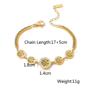 Macro shot of gold stainless steel Tree of Life bracelet with lobster clasp and extensions