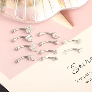 9-piece set of silver stainless steel eyebrow and cartilage studs with zircon shapes