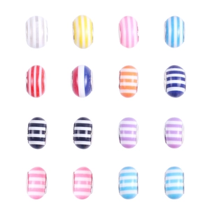 Macro shot of 16 colorful striped resin beads with metal core for DIY ocean jewelry