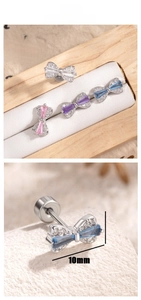 Detailed view of 10mm zircon bow earrings in four colors with screw back design
