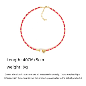 Détail du collier avec longueur 40+5cm, pendentif œil de démon et poids de 9g