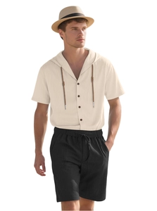 Close-up of beige linen hooded shirt and black drawstring shorts set for summer travel