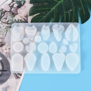 Top view of geometric silicone molds for resin jewelry with varied shapes and patterns