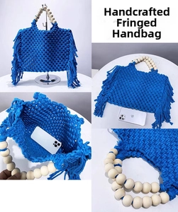 Detailed view of Klein blue woven mini handbag with tassel fringe and wooden bead handles