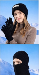 Detail of the high-quality thermal knitted balaclava with mountain logo patch in winter