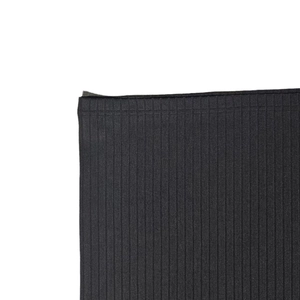 Close-up of black ribbed knit fabric showing detailed vertical texture and stitching