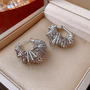 Silver hollowed triangle hoop earrings with a textured woven design for women