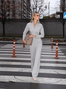 Chic grey slim fit knit tracksuit set featuring a zipper jacket and wide-leg trousers