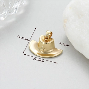 Detailed view of a gold cowboy hat charm with precise dimensions 14.23mm by 21.9mm