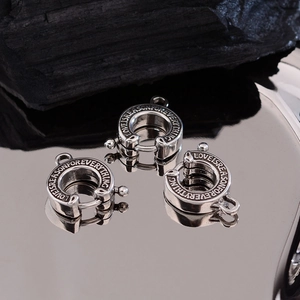 Polished silver horseshoe round clasp with engraved Love Is A Reason For Everything
