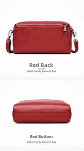 Detail view of red pebble grain leather crossbody bag showing back pocket and bottom base