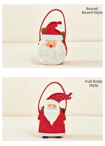 Detailed view of two Santa Claus felt Christmas gift bags with plush faux fur beards