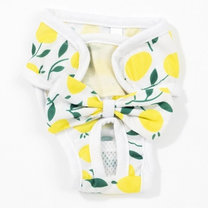 Dog sanitary panty with yellow lemon print and large bow on white breathable cotton fabric