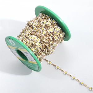 Detail of DIY 18K gold plated chain with white and yellow enamel daisy flower charms