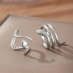 Snake shaped stainless steel open rings with detailed scale textures in silver finish