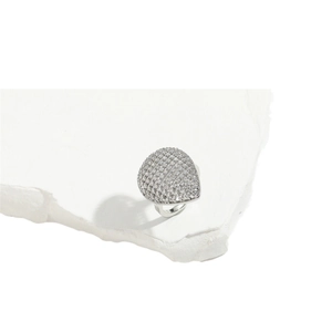 Silver adjustable open ring with oval pave teardrop design on textured stone