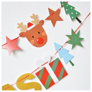 Detail of Christmas banner featuring golden glitter letters and reindeer cardstock cutout