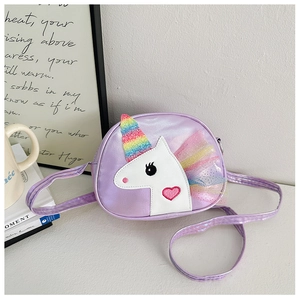 Close-up of a purple unicorn crossbody bag with rainbow mesh mane and heart detail