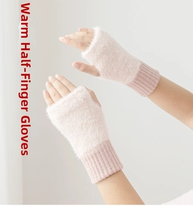 Detail of pink and beige plush fingerless gloves with ribbed knit cuffs for winter warmth
