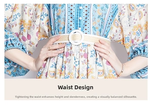 Detail of bohemian floral dress showing waist belt and intricate ethnic print fabric