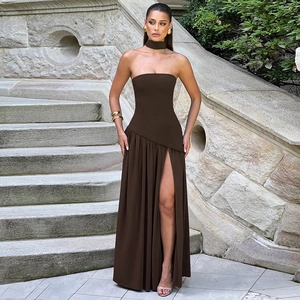 Detail view of deep brown strapless maxi dress with side slit and elegant neck ribbon