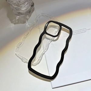Detailed view of wave-edge phone cases in clear and black finishes with rainbow shadows