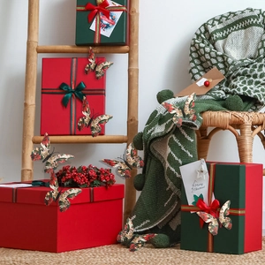 3D Christmas butterfly wall stickers with festive floral patterns on gift boxes