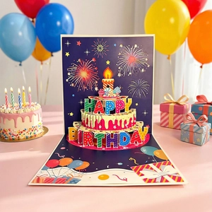 3D pop-up birthday card with a tiered cake design, music, and colorful balloons background