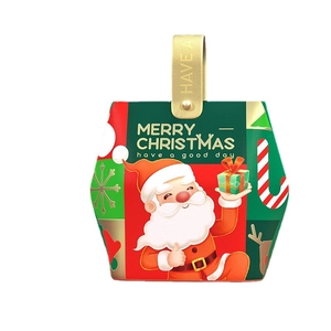Festive Merry Christmas gift box with Santa Claus patterns and golden handle