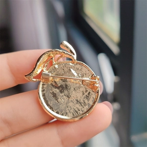 Fashionable golden apple shaped enamel brooch with detailed alloy textured back pin