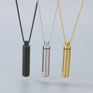 Cylindrical stainless steel urn pendant necklace in black, gold, and silver finishes