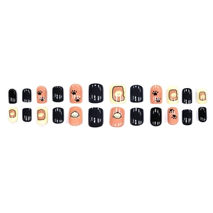 Cute puppy cartoon press-on nails set in black and yellow summer theme with paw prints