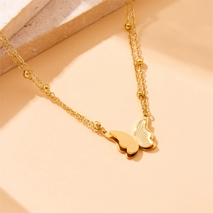 Gold stainless steel double-layered butterfly pendant necklace with beaded chain