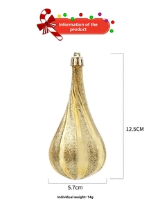 Detailed view of a gold teardrop Christmas ornament with spiral ribs and glitter finish