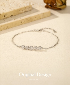 Macro detail of S925 sterling silver flower bracelet with sparkling cubic zirconia stones