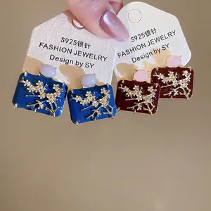 Vintage style square enamel earrings with plum blossom relief in royal blue and dark red