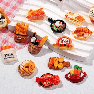 Macro shot of miniature resin food collection with bread baskets and breakfast pans