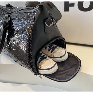 Bolso de viaje negro de lentejuelas con compartimento para zapatos y gran capacidad.